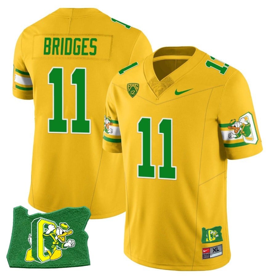 Menâ€™s Oregon Ducks â€˜Mighty Oregonâ€™ Throwback Football Stitched Jersey â€“ Oregon State